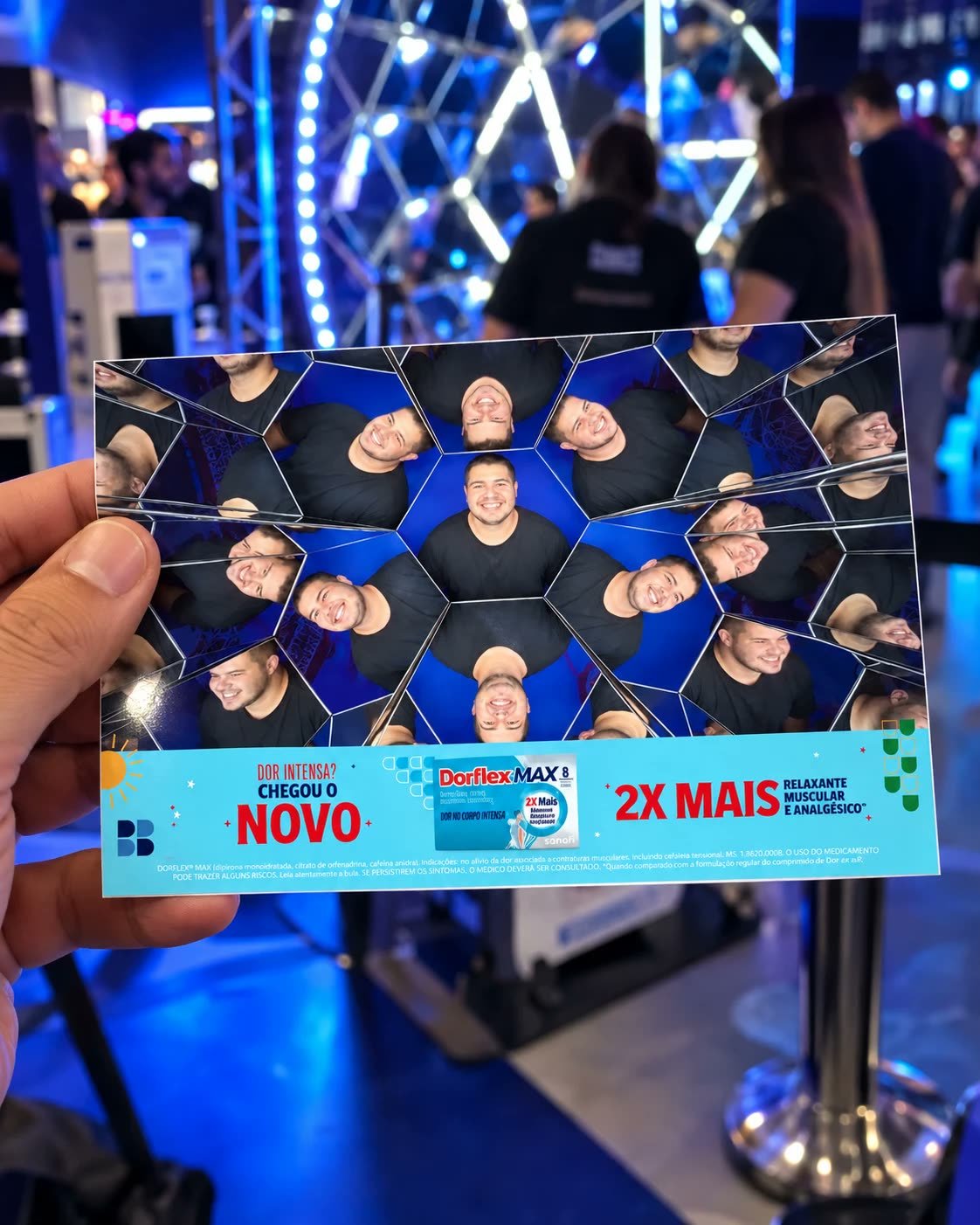 Photo printed at the kaleidoscope, in the guest's hand, with the campaign message on the bottom strip