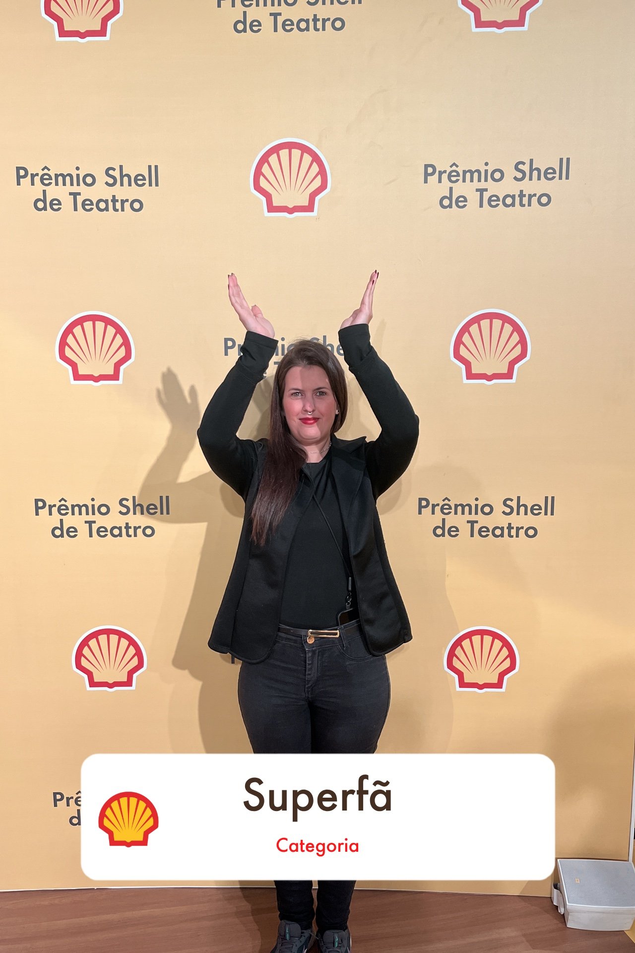 Original photo of the guest posing with arms raised